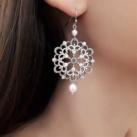 Boucles d’Oreilles de Luxe Femme .